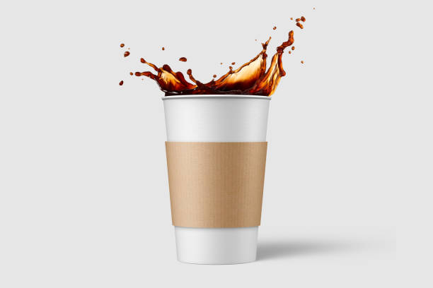 istock Paper coffee cup with sleeve and coffee splash mockup template, isolated on light grey background. 2159307592
