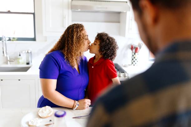 istock Mother and son share a close moment over breakfast before heading out for the day 2159309242