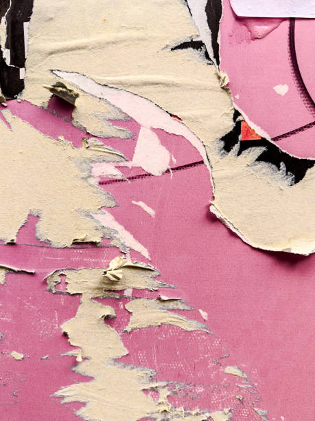 istock Vintage old posters stuck and torn on the wall in your grunge background 2159309800