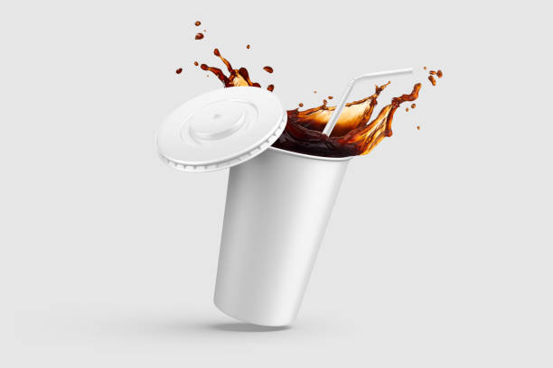 istock Paper soda cup with cola splash and straw mockup template, isolated on light grey background. 2159310402