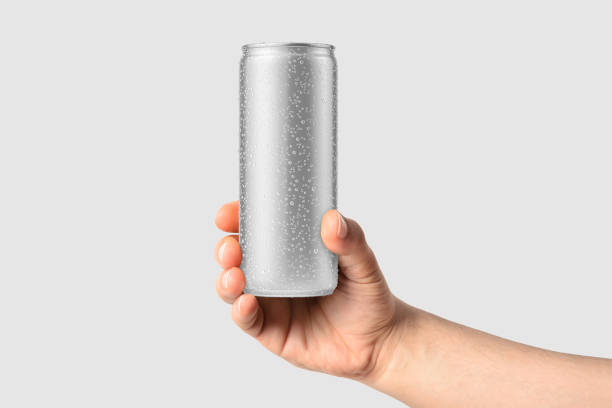 istock Aluminium drink can 250ml with water drops in a hand mockup template, isolated on light grey background. 2159311038