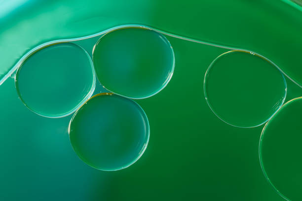 istock Close up ,oil drops floating on water surface 2159313367