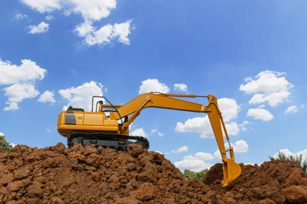 istock Excavators are digging the soil in the construction site 2159313517