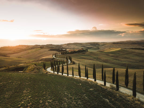istock winding road in tuscany at crete senesi 2159315241