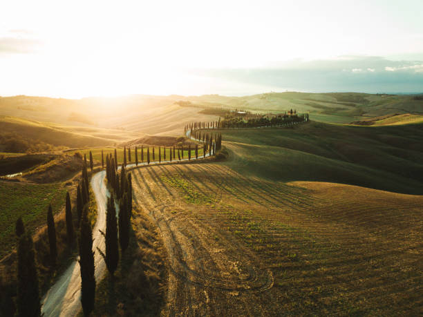istock winding road in tuscany at crete senesi 2159315270