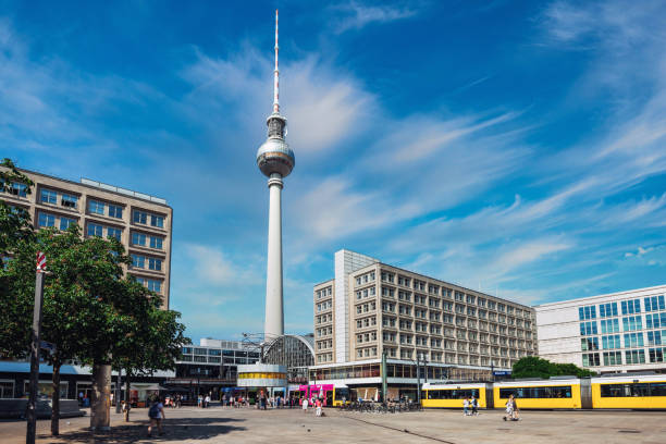 istock yellow tram at Alexanderplatz in Berlin in summer 2159318082