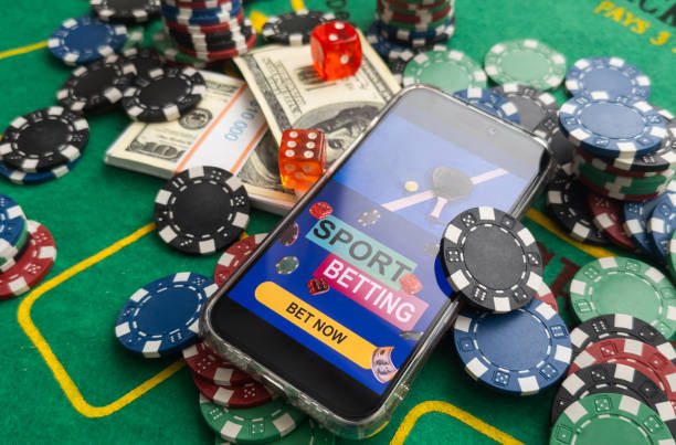 istock online casino smartphone with poker chips device over green table 2159319483