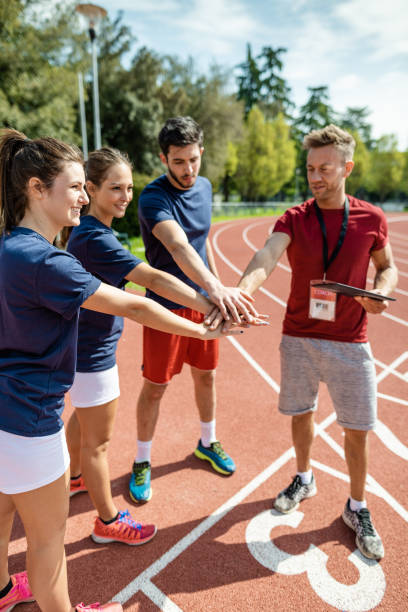 istock sport people teamworking to win 2159320054