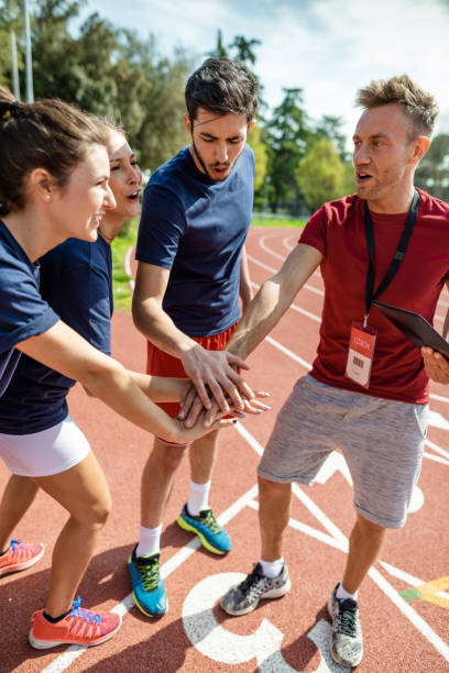 istock sport people teamworking to win 2159320084