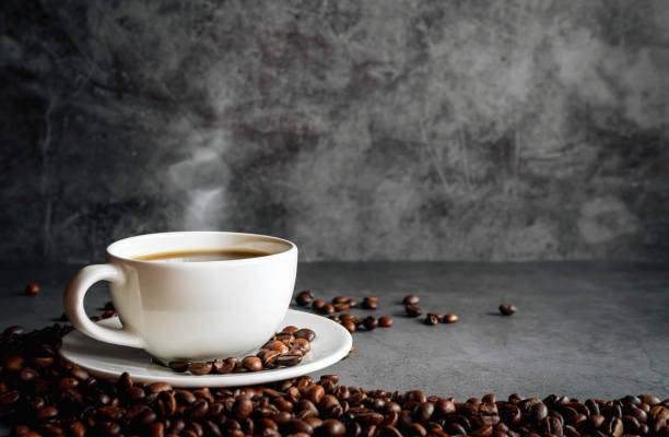 istock Coffee cup and coffee beans on  gray background, Black coffee cup aromatic 2159320710