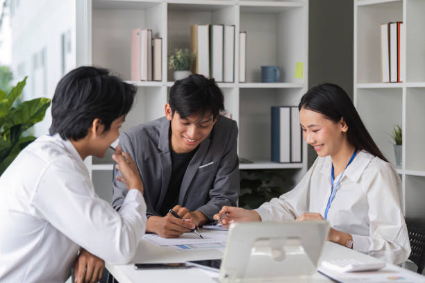 istock Business Team Collaborating in Modern Conference Room for Idea Exchange and Strategic Planning 2159321348