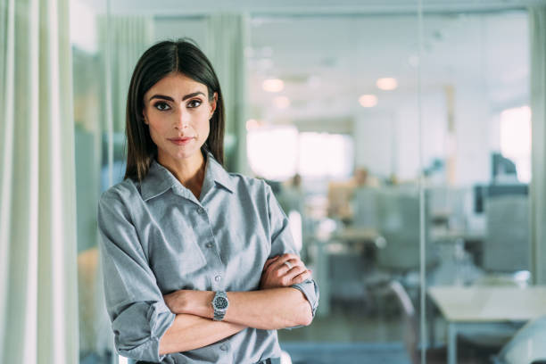 istock Confident businesswoman in modern office. 2159321490