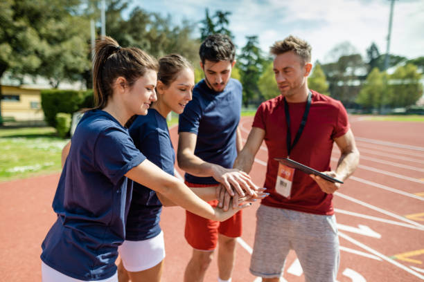 istock sport people teamworking to win 2159321863