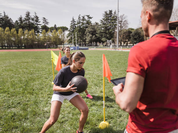 istock group of people doing sport with obstacles 2159322763