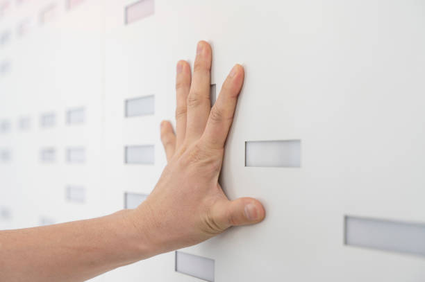 Businessman's hand with icon, The businessman's hand presses the switch button.