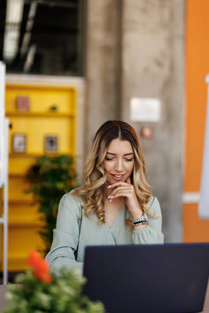 istock Concentrated businesswoman at work place 2159325929