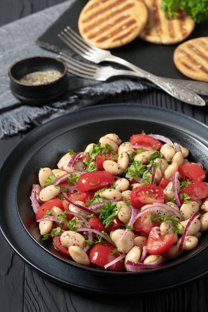 istock Piyaz, Turkish white bean salad in a bowl 2159327927