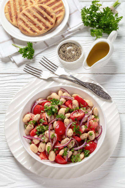 istock Piyaz, Turkish white bean salad in a bowl 2159327928