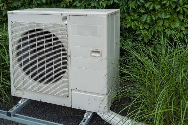 istock Heat Pump in Garden Close-up 2159334476
