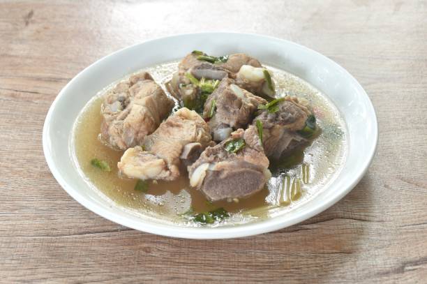 istock hot and spicy pork bone with tamarind and Thai herbs soup 2159336206
