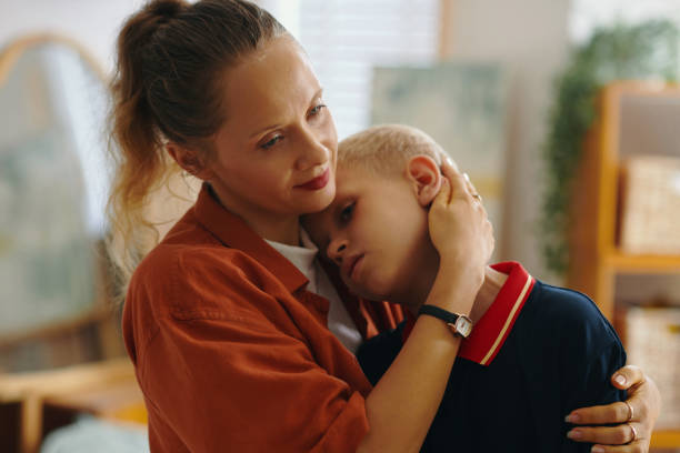 istock Lovely Mother Hugging Her Son 2159339780