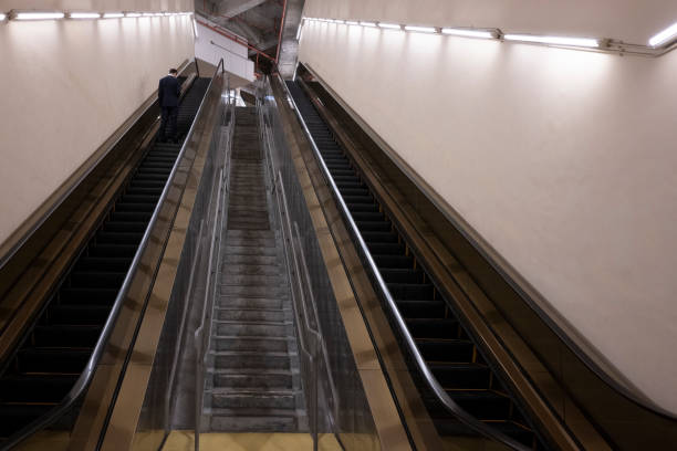 An electric escalator inside a commercial office building