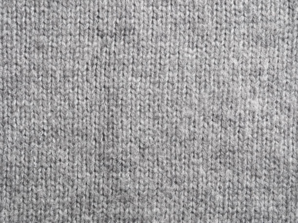 istock coarse knitted wool fabric, fabric background, close-up 2159343101
