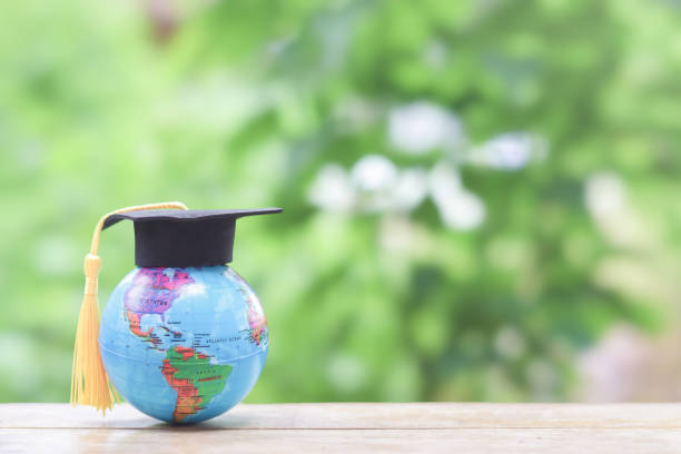istock Earth globe with graduation hat. Copy space for text, Back to school, Education concept 2159346285