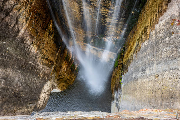 Beautiful view from above waterfall looking down to green pool below in Chattanooga, TN lookout mountain