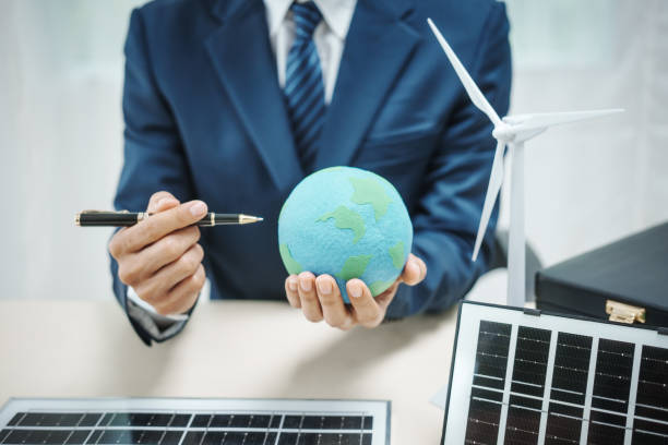 istock A professional man works on solar panel installation, focusing clean energy solutions. He reviews blueprints and designs in an office setting innovative construction development for a modern house. 2159351531