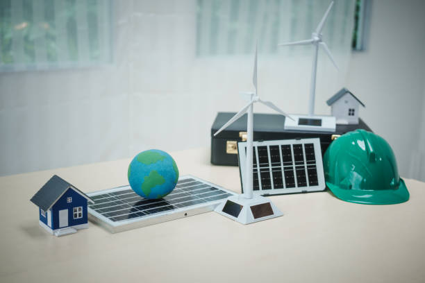 istock A professional man works on solar panel installation, focusing clean energy solutions. He reviews blueprints and designs in an office setting innovative construction development for a modern house. 2159351538