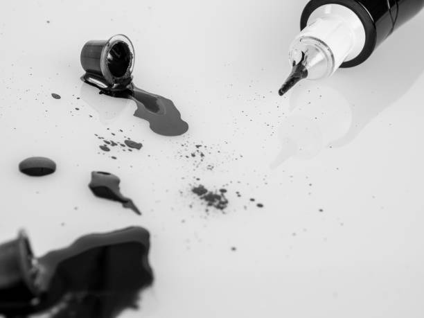 istock Tattoo machine for tattooing , permanent makeup, with jars of paint, close-up needle, selective focus 2159360672