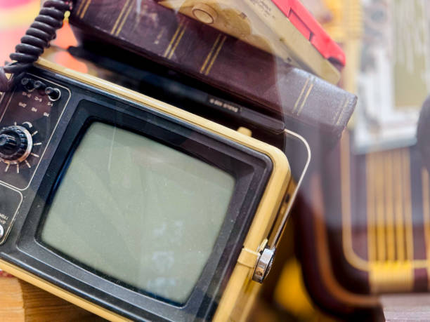 Vintage TV Set with Books on top  concept