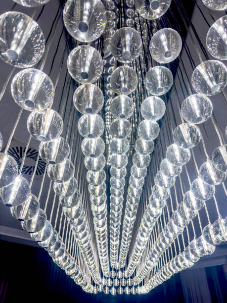 istock Large glass modern style chandelier, close up 2159364099