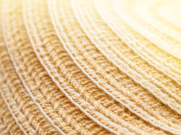 Fabric material for sewing hats, woven texture background, selective focus, close-up