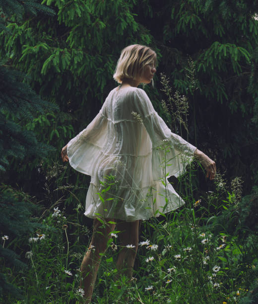 istock young beautiful woman in action at nature 2159365726
