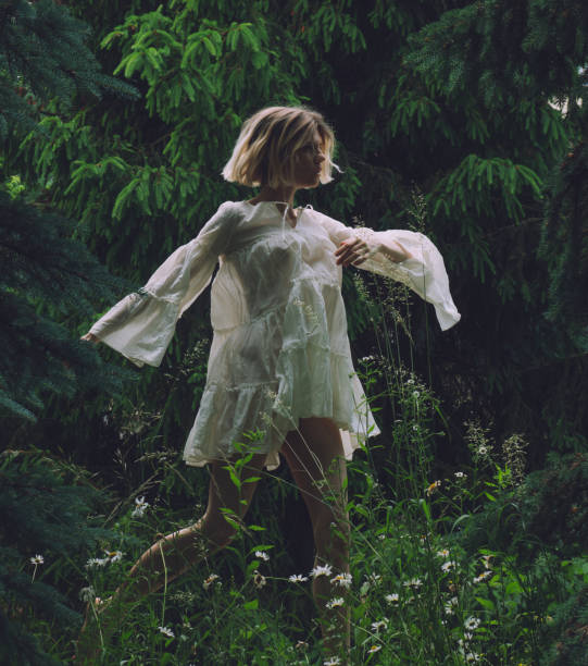 istock young beautiful woman in action at nature 2159366185