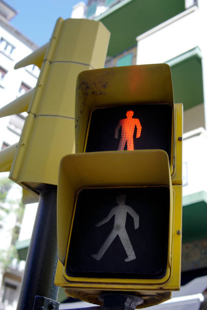 istock yellow pedestrian traffic light in the city 2159367893