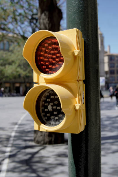 istock yellow pedestrian traffic light in the city 2159367897