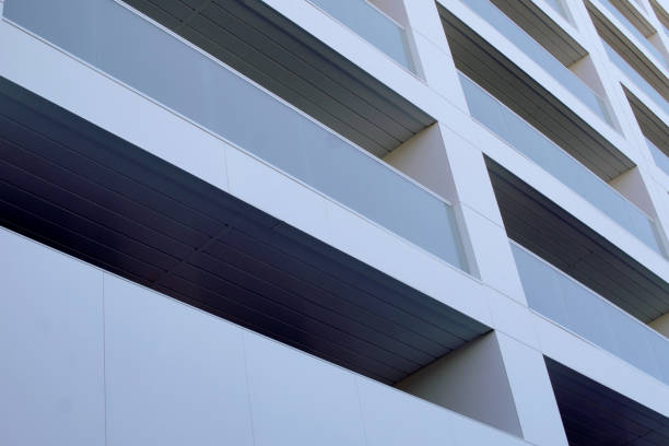 istock architectural background of facade with modern glass balconies 2159367941
