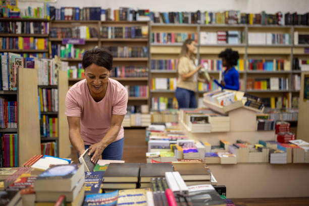 istock Woman browsing to buy a book 2159370898