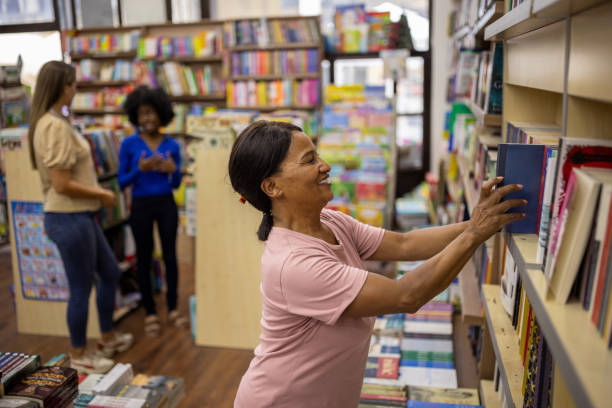 istock Woman browsing to buy a book 2159371062
