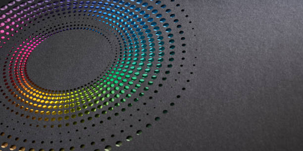 istock Circular paper cutout artwork with a vibrant rainbow gradient of dots on a dark textured background 2159373535