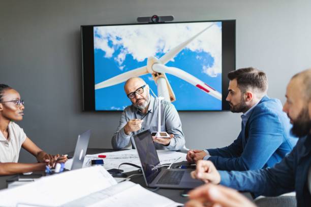 istock Business meeting on sustainable energy resources: windmills 2159373691