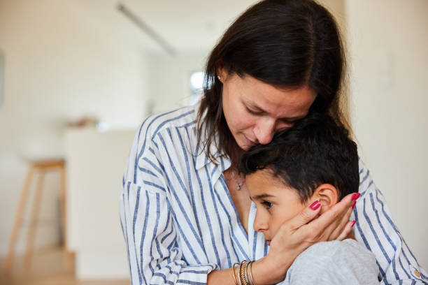 istock Loving single mom consoling her little boy at home 2159374727