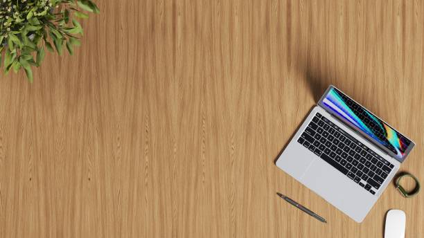 istock Top view of office table with notebook - mockup 2159374859