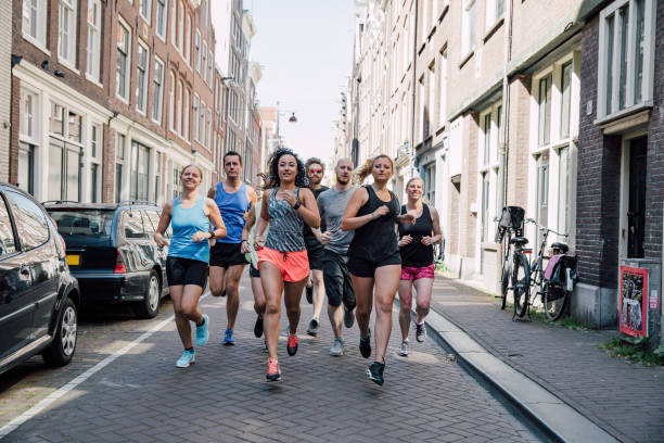 Group of runners training in the city streets
