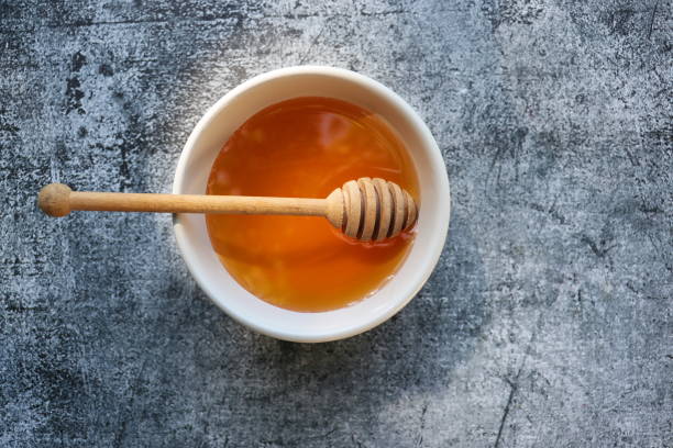 istock Organic Honey with Honey Dipper 2159375629