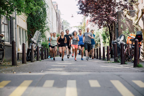 istock Group of runners training in the city streets 2159375772