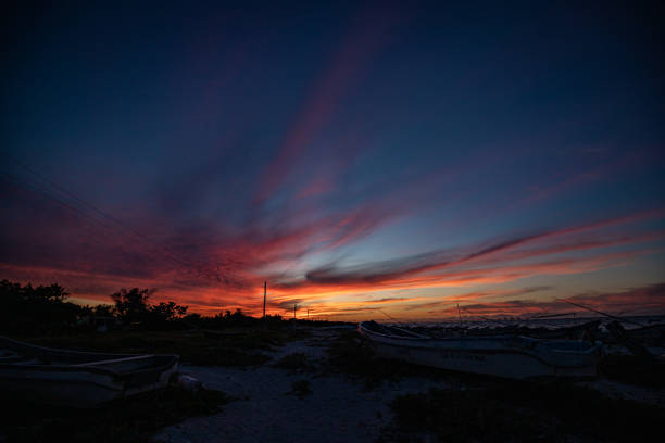 Beautiful sunset with red clouds and blue sky in Yucatan, Mexico
